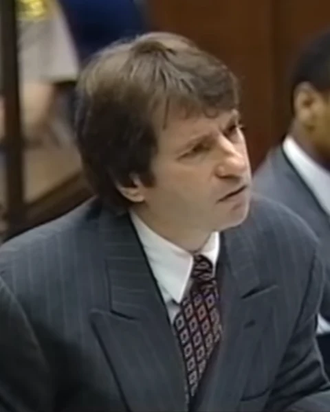 Courtroom still of Barry Scheck.