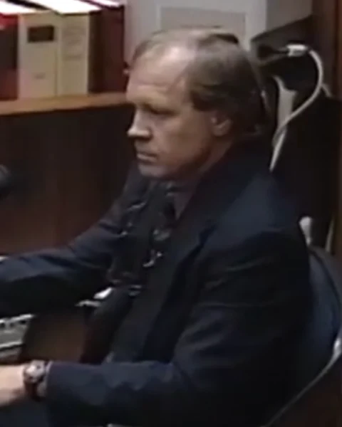 Courtroom still of Bill Renken.