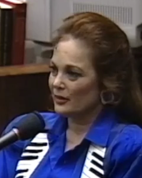 Courtroom still of Carol Connors.