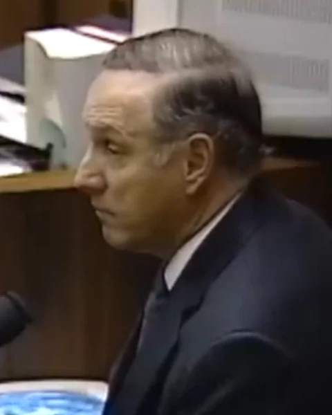 Courtroom still of Charles Cale.