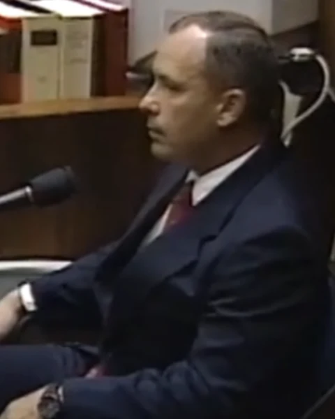 Courtroom still of Comm. Keith Bushey.