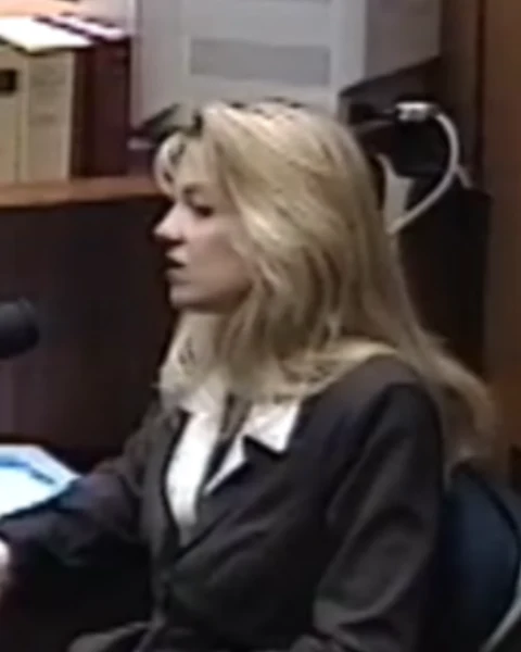 Courtroom still of Debra Guidera.