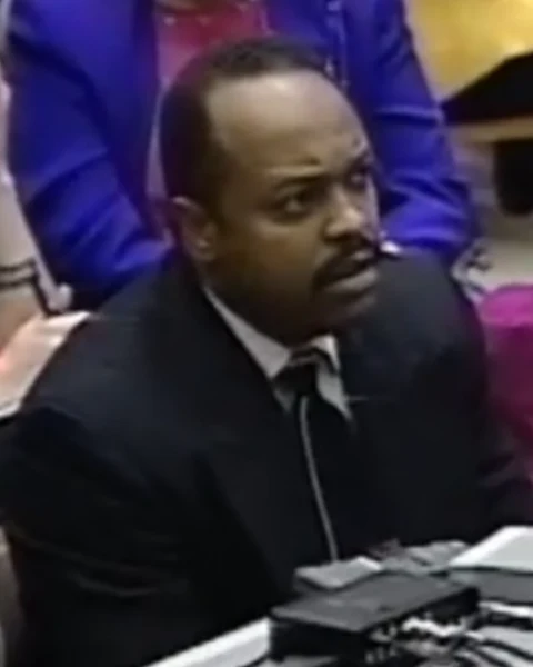 Courtroom still of Howard Harris.