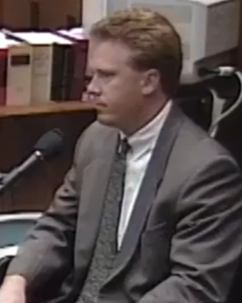 Courtroom still of Jim Merrill.