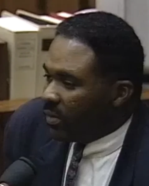 Courtroom still of Michael Norris.