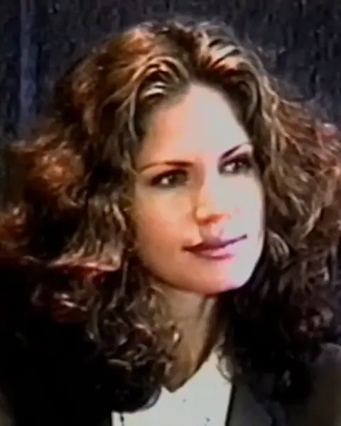 Deposition video still of Paula Barbieri.