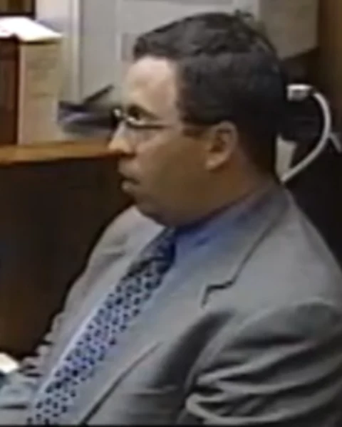 Courtroom still of Samuel Poser.