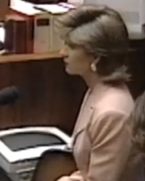 Courtroom still of Tracie Savage.